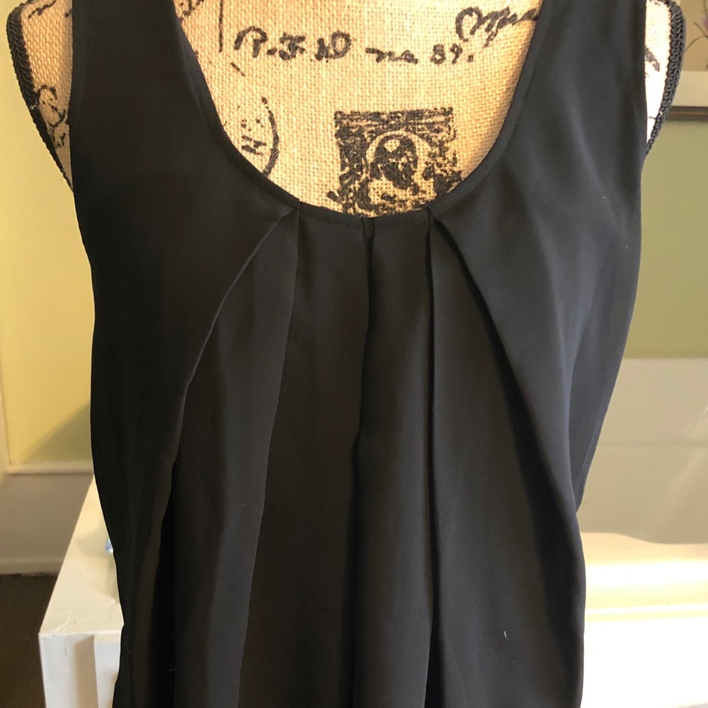 Black sleeveless blouse